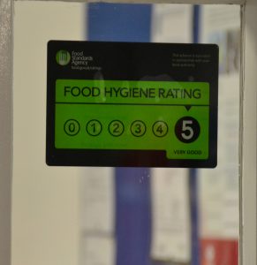 The sign shows our food hygiene rating is the highest: 5, Very Good.
